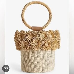 Straw bucket bag with flowers perfect for summer
